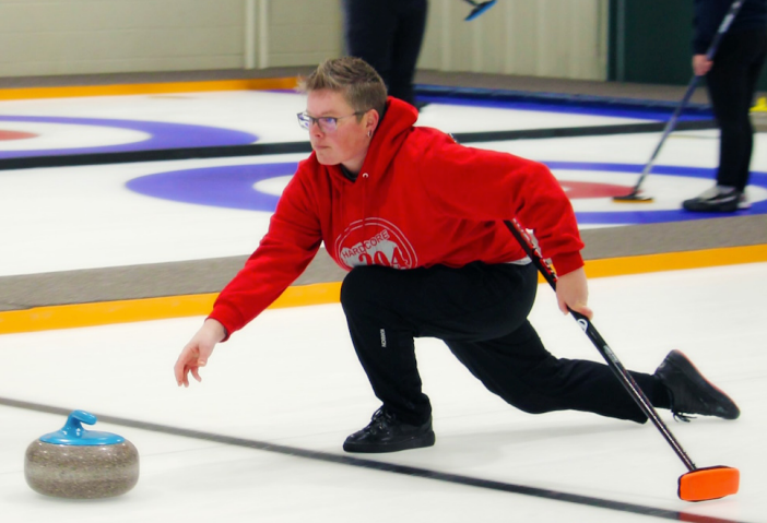 personne qui fait du curling